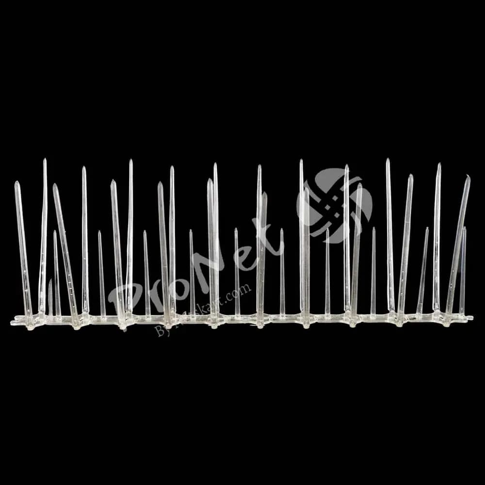 Side view of ProNet transparent 3 row bird spikes for wider pigeon landing prevention on building surfaces
