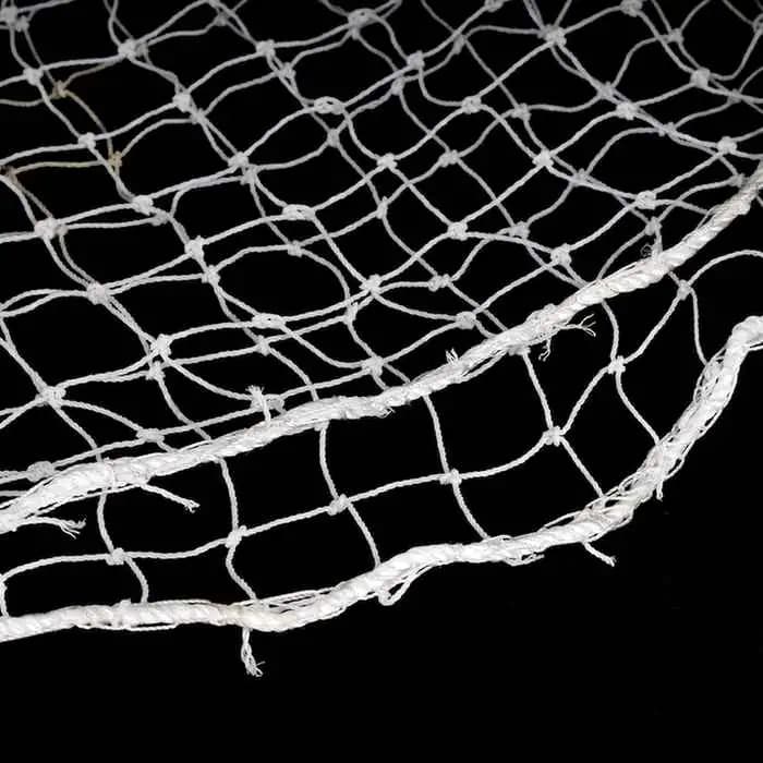 Close-up view of Garware HDPE bird net showing strong mesh knots and border rope for durable balcony bird protection