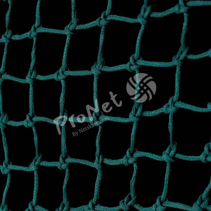 Angled view of green Garware Monkey Net with 50 MM mesh for monkey-prone balconies and building areas